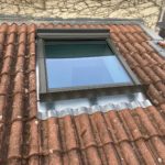 Fenêtre de toit Velux à Limoges avec un entourage en Zinc